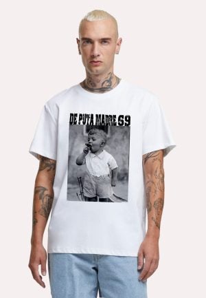 A Man With Tattoos On His Arms